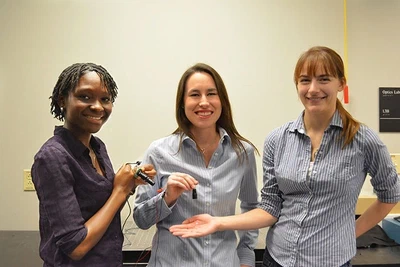 **Webcam LSCI Team:** Janel, Lisa, and Katherine with the [webcam LSCI system](/publication/richards-2013) comprised of a webcam, plastic aspheric lenses, and a laser pointer (September 2013).